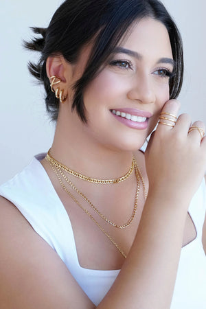 Piercing em X Liso Banhado a Ouro 18K