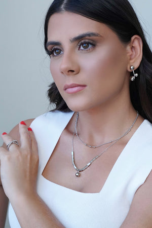 Anel Bolinhas em X Tamanho 15 Ródio Branco