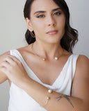 Aro Bola Lisa e Pérola Banhado a Ouro 18K