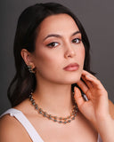 Brinco Palito Curvado Bolas Lisas Banhado a Ouro 18K