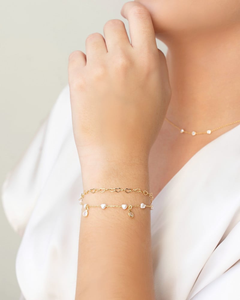 Pulseira Dupla Corações Pérolas Banhado a Ouro 18K