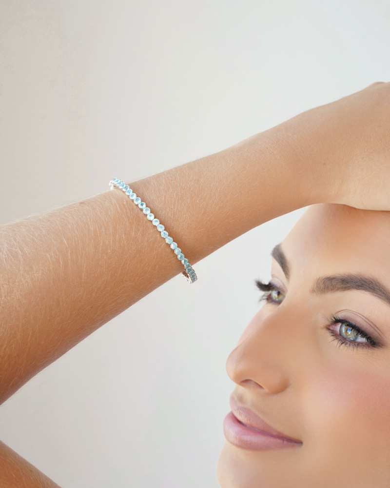 Bracelete Mola Cravejado Topazio Sky 4 mm Ródio Branco