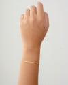 Pulseira Bolinhas Achatadas Banhado a Ouro 18K