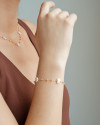 Pulseira Bolinhas Borboletas Pérolas Banhado a Ouro 18K