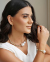 Bracelete Torcido Pérola Banho Dourado
